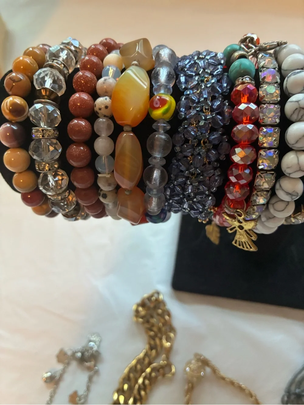 33 Vintage and modern bracelets. Some are stretchy and some aren’t.